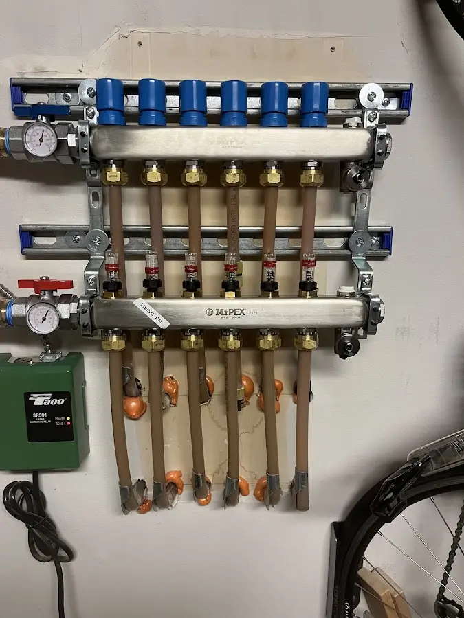 Plumber performing Water Heater Repair at a residential property in Carlisle